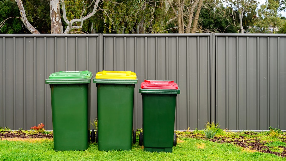  yard with garbage bins